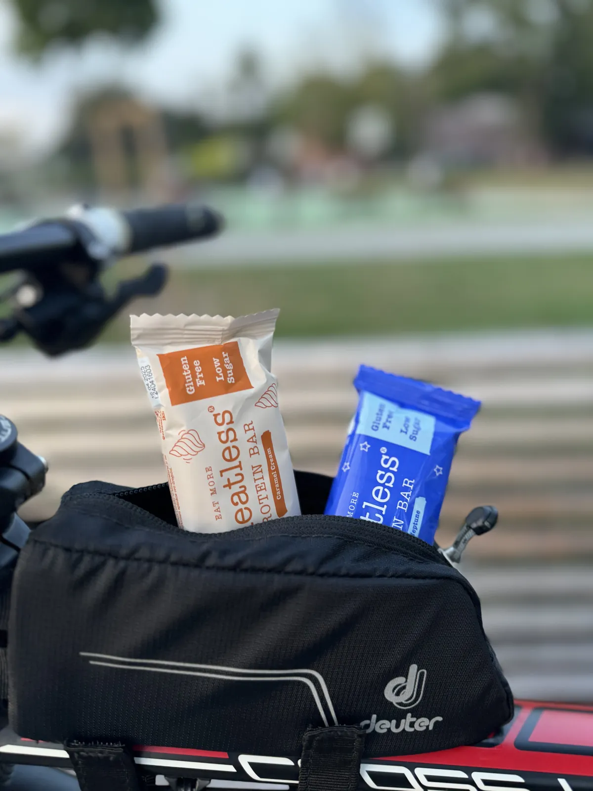 Two Cheatless bars by a bike